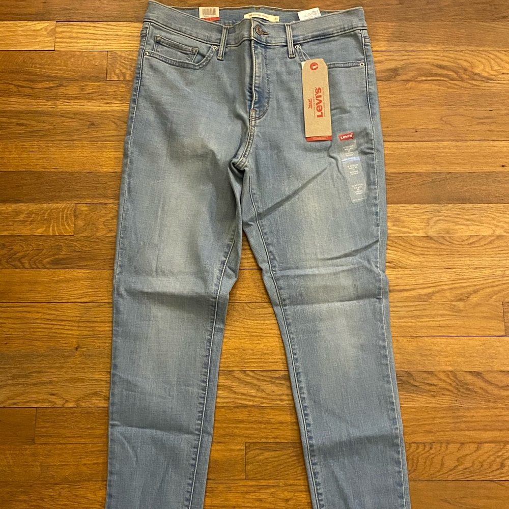 Levi’s light medium wash jeans